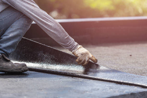 Professional Waterproofing technician working in Richmond, VA
